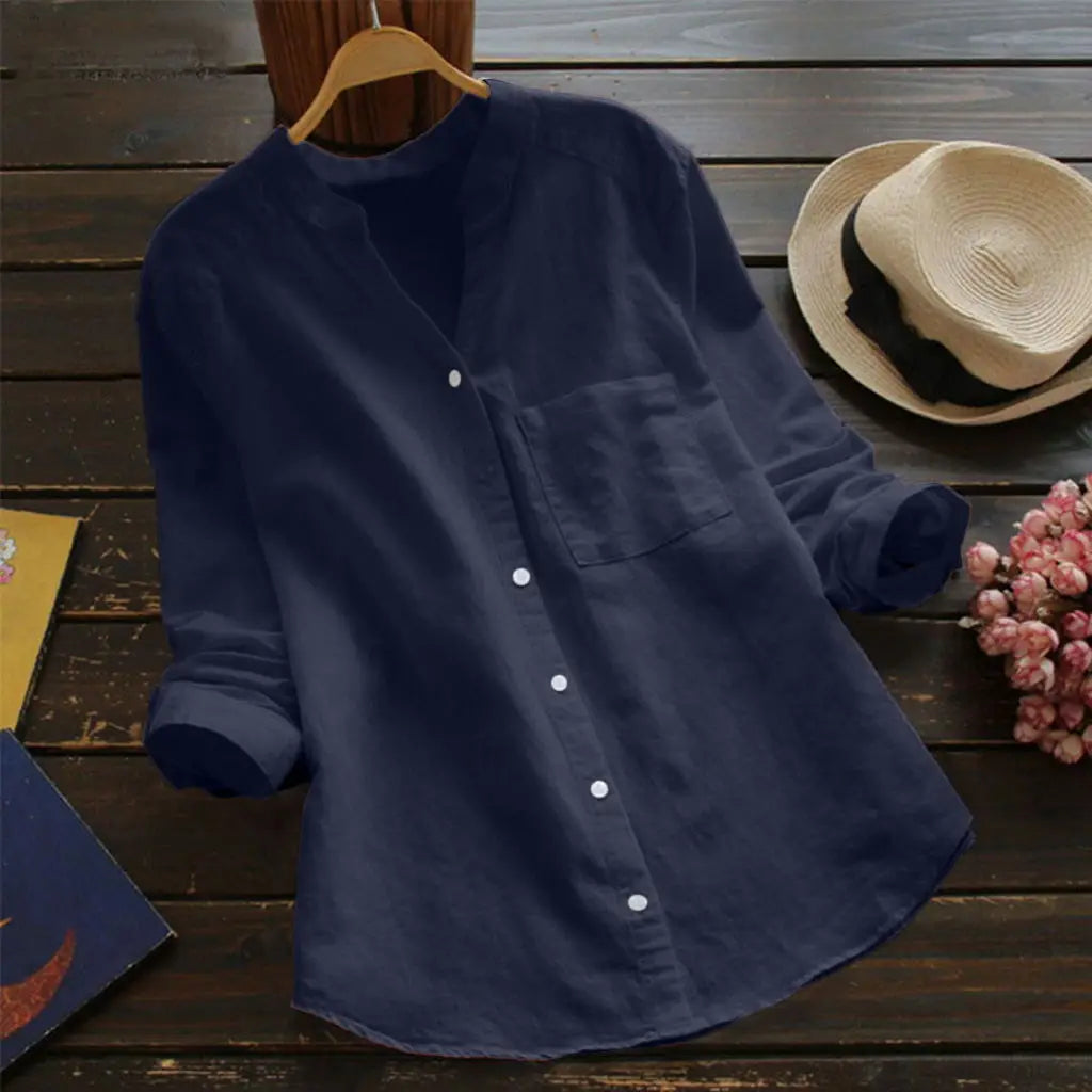 Duval Paris™ | Blouse unie à col en V