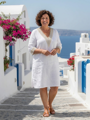 Elira | Robe longueur genou à col en V et manches trois-quarts
